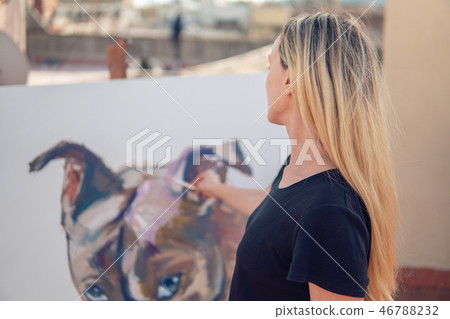 Young woman paint artist drawing at home roof 46788232