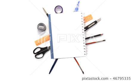 Notebook with stationary objects in the background 46795335