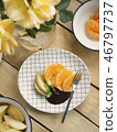 poached apples & fresh orange with chocolate sauce 46797737