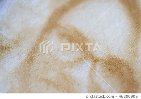 Drawing of a woman's face on a foam coffee latte in a glass created by a 3D printer Drawing of a woman's face on a foam coffee latte in a glass created by a 3D printer 46800909