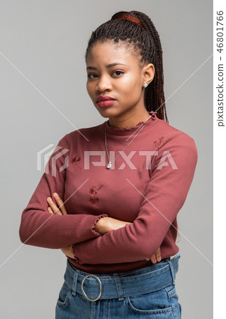 Portrait of beautiful African American girl standing with bent hands 46801766