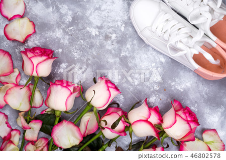 valentines day background frames with rose flowers bouquet and shoes on stone background. top view valentines day background frames with rose flowers bouquet and shoes on stone background. top view 46802578