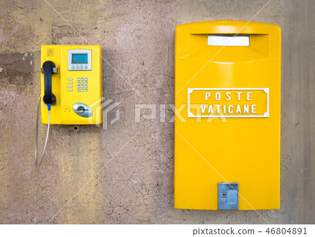 Yellow post box in Vatican 46804891