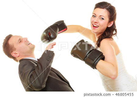 Bride boxing her groom on wedding Bride boxing her groom on wedding 46805455