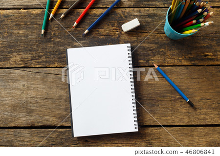 blank paper and colorful pencils on old wooden blank paper and colorful pencils on old wooden 46806841