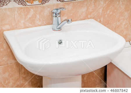 The photo of a sink in a bathroom 46807842