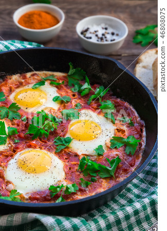 Shakshuka in iron skillet Shakshuka in iron skillet 46808075