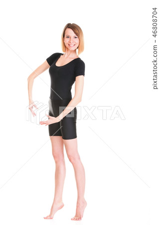Fit woman doing exercise isolated on white Fit woman doing exercise isolated on white 46808704