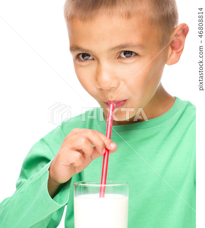 Cute little boy with a glass of milk 46808814