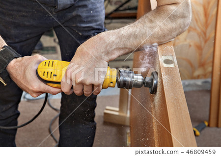 Electric drill lock hole drilling through door Electric drill lock hole drilling through door 46809459