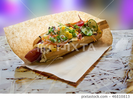 Hot hotdog packed in a paper bag 46810813