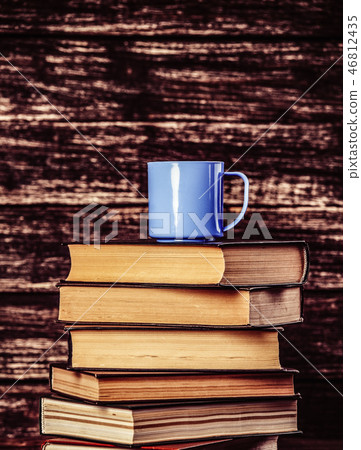 blue cup of coffee on books blue cup of coffee on books 46812435