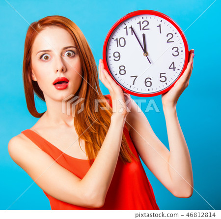 girl with huge clock on blue background. girl with huge clock on blue background. 46812814