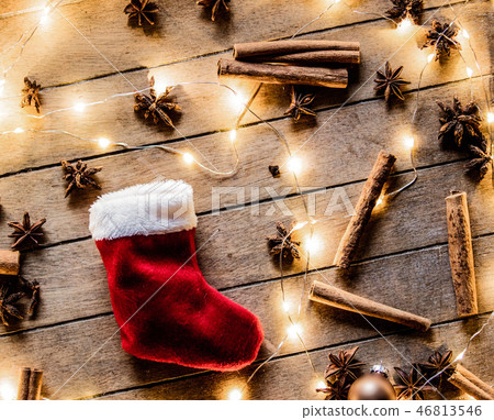 red Santa Claus sock and Christmas lights red Santa Claus sock and Christmas lights 46813546