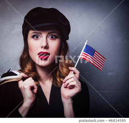 girl with shopping bags and flag of USA 46814595