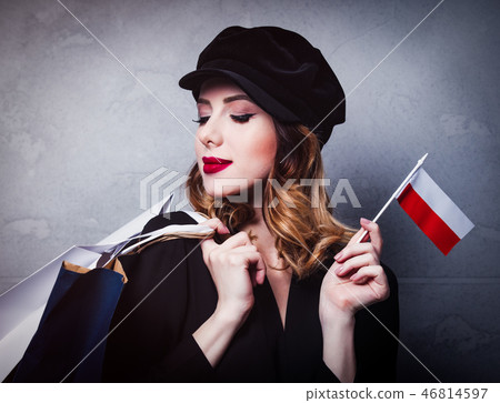 girl in hat with shopping bags and flag of Poland  46814597