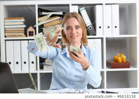 Beautiful businesswoman portrait. Scattering money 46818138