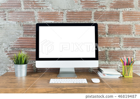 workspace with computer with blank white screen workspace with computer with blank white screen 46819487