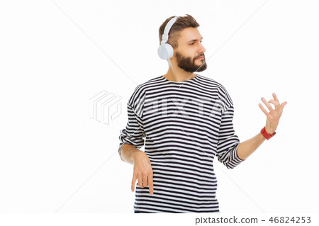 Pleasant nice man listening to instrumental music 46824253