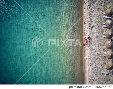 Beautiful beach with family drone shot Beautiful beach with family drone shot 46824506