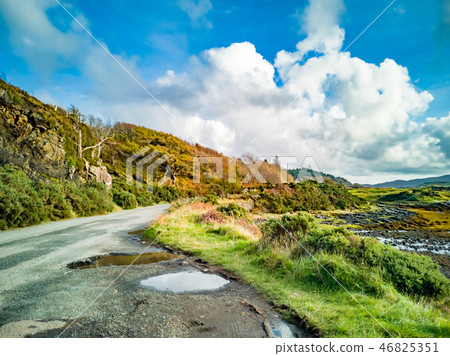 Single track road next to Loch Dunvegan in autumn, Isle of Skye, Scotland 46825351