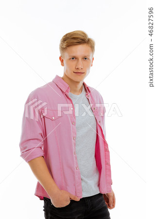 Nice handsome man putting a hand in the pocket 46827596