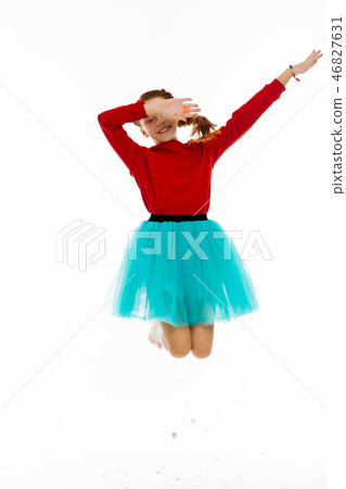 Cheerful positive girl being in the air Cheerful positive girl being in the air 46827631