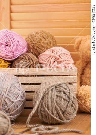 Woolen yarn and fabric on the window sill 46827835