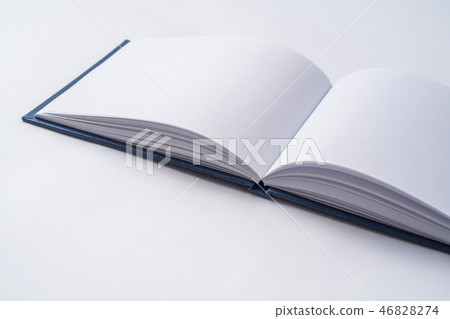 Perspective blue notebook with open page 46828274