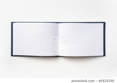 Top view of blue notebook with open page 46828290