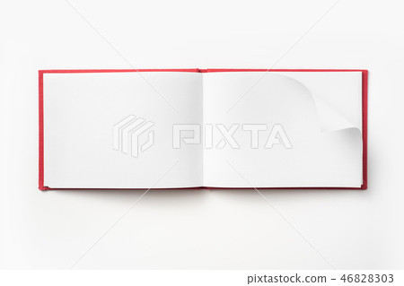 Top view of red notebook with open page 46828303