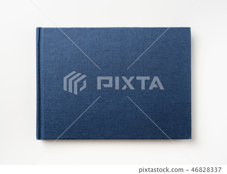 Top view of blue hardcover notebook and pencil 46828337