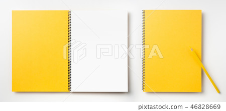 Top view of yellow spiral notebook, page, pencil Top view of yellow spiral notebook, page, pencil 46828669