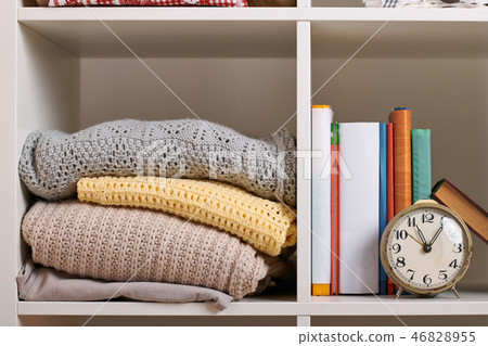 shelves with various things in the room 46828955