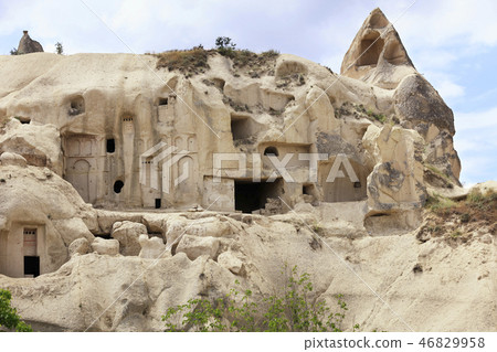 Old ancient cave temple in the mountain valley Old ancient cave temple in the mountain valley 46829958