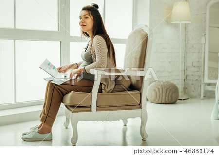 Pregnant woman dreaming about the appearance of her future child 46830124