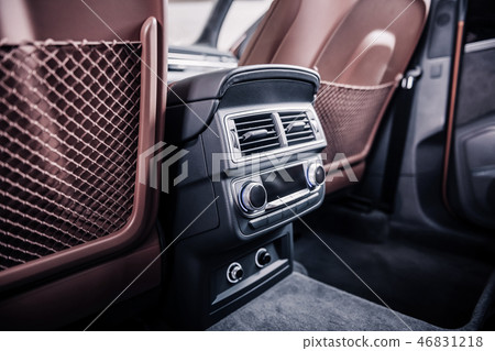 Close up of air and music system in front of the back seat Close up of air and music system in front of the back seat 46831218