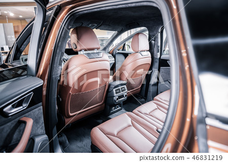 New hatchback car with brown leather interior with opened doors New hatchback car with brown leather interior with opened doors 46831219