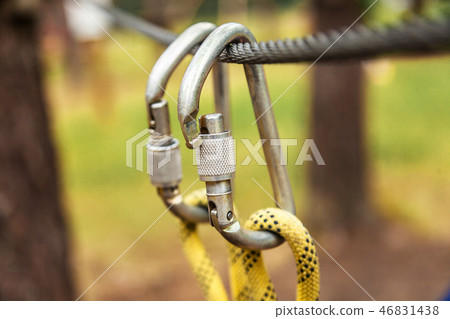 Carabiners weigh on safety rope Carabiners weigh on safety rope 46831438