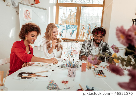 Talented artists laughing while feeling funny working together 46831570