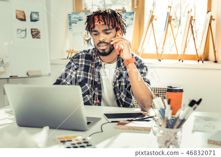 Busy overloaded interior designer arranging meeting with client 46832071