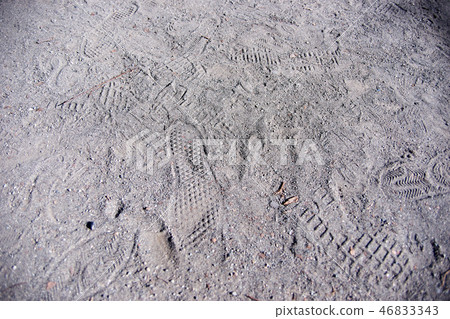 Footprints on the sand ground 46833343