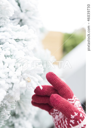 Girl in the garden of artificial snow Girl in the garden of artificial snow 46839730