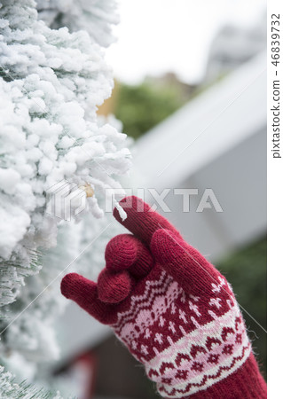 Girl in the garden of artificial snow Girl in the garden of artificial snow 46839732