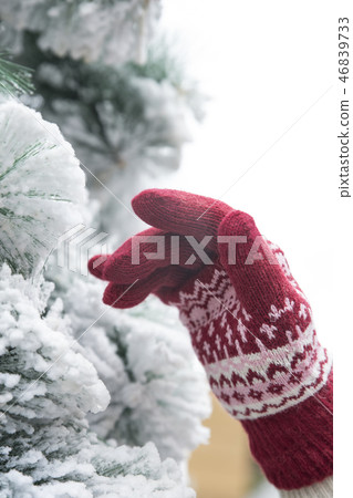 Girl in the garden of artificial snow Girl in the garden of artificial snow 46839733