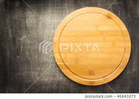 cutting board at old wooden table 46843873