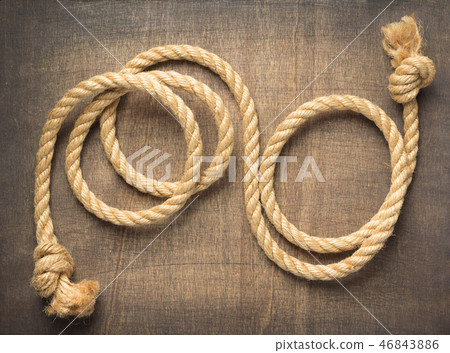 ship rope at wooden background ship rope at wooden background 46843886