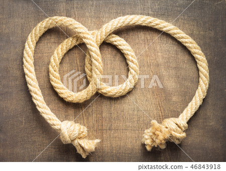ship rope at wooden background 46843918