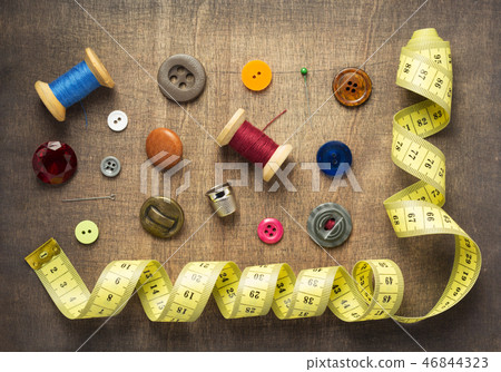 tailor or sewing accessories and supplies with tools at wooden table Stock  Photo by seregam