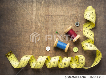 sewing tools and accessories on wooden table sewing tools and accessories on wooden table 46844340